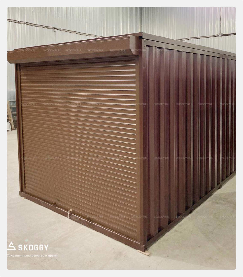 Коричневый хозблок с роллетными воротами